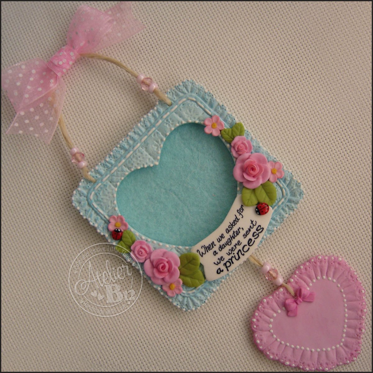 AtelierB12's tweet image. #Personalizedbabyframe #Babygirlgift #Keepsakeframe #Princessroomdecor 
#Babyshower #Newbaby #Baptizedgift #GodMotherGift #Niecegift
A cute little hanging photo frame reads &quot;When we asked for a daughter we
were sent a princess.&quot;
@AtelierB12