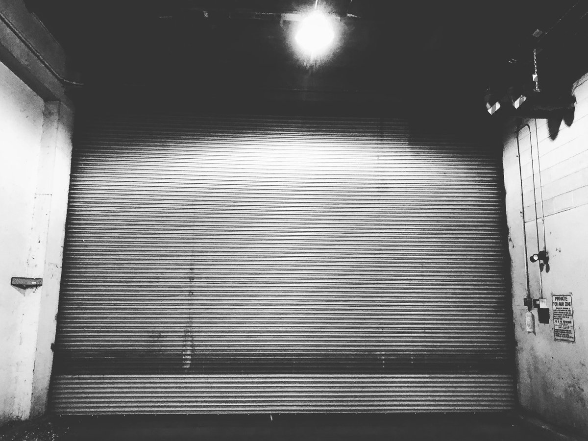 440Photography's tweet photo. #cleveland #clevelandphotographer #intheshadows #downtowncleveland #bnw #bnwphotography #bnw_greatshots #garage #shadyplace #garagedoors #rustbelt https://t.co/JtW096WXOl