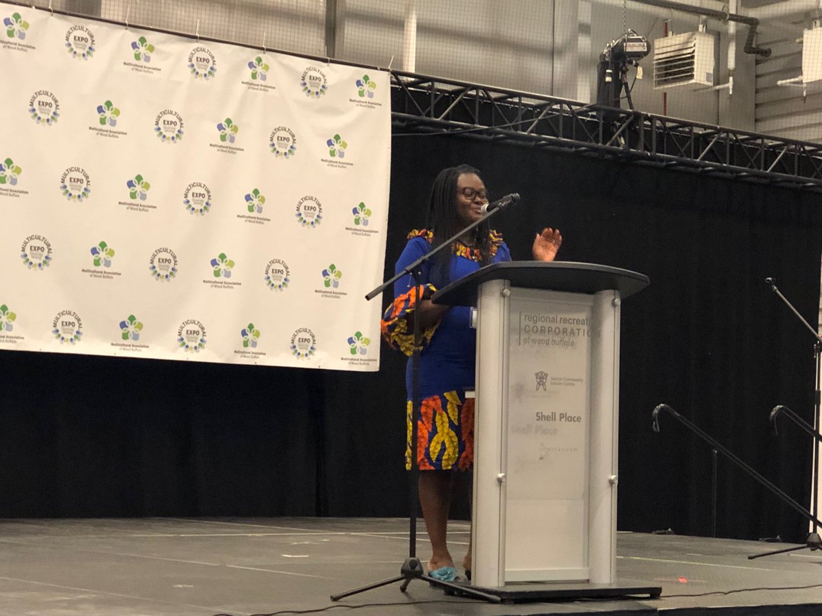 President Gogo from the ⁦<a href="/mca4wb/">Multicultural Association of Wood Buffalo (MCA)</a>⁩ brings greetings to open the 2019 multicultural expo in #ymm #celebrate #diversity at ⁦@MacDonaldIsland⁩
