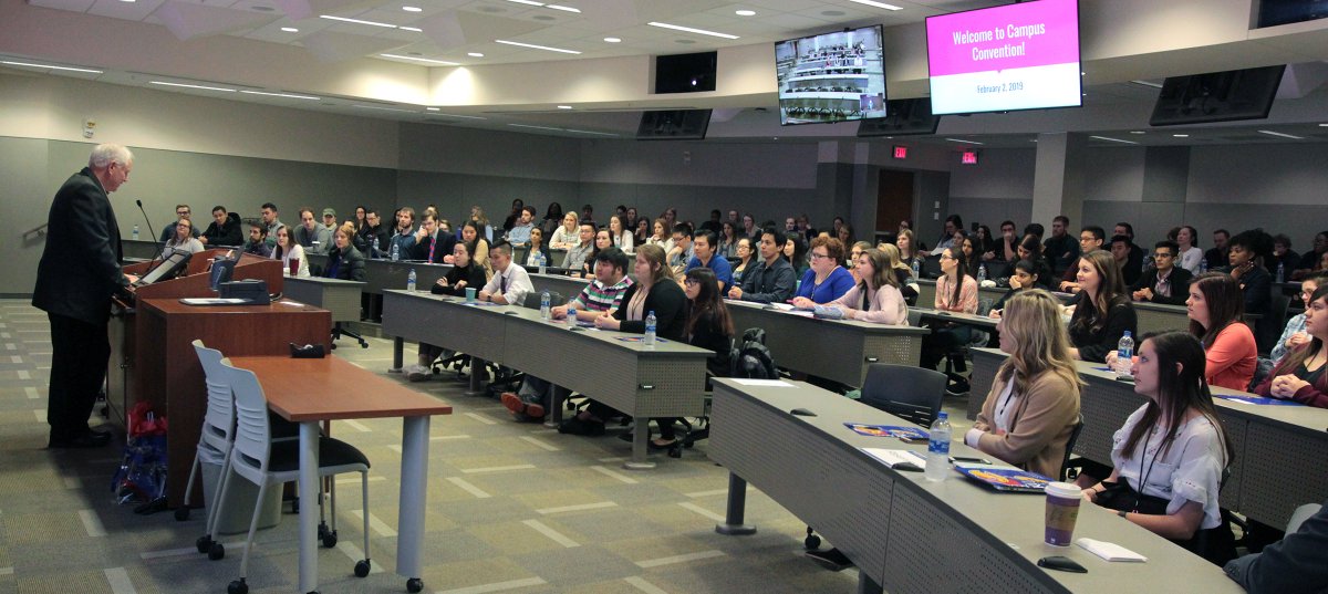 KUPharmacy's tweet photo. Dean Ken Audus &amp; Assistant Dean Joe Heidrick kick off the 8th Annual Campus Convention Saturday morning. Looking forward to a great day with pre-pharmacy students, current students &amp; professional pharmacists coming together to talk about pharmacy's most pressing issues. #KU2019CC https://t.co/2qW3TkBOvj