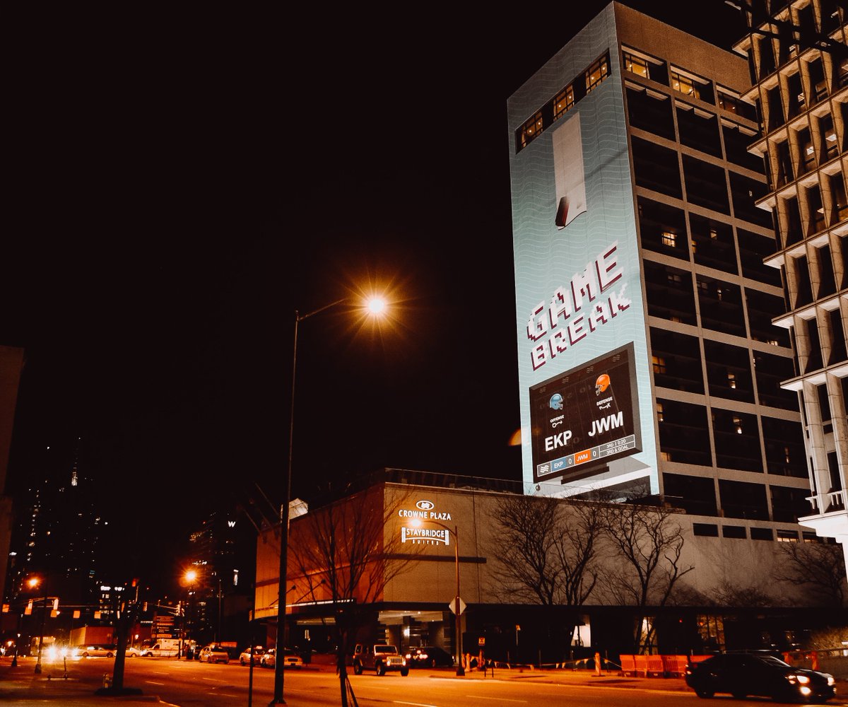 NickCannon's tweet photo. That game last night was HUGE! @IHG has a video game projected on the side of the Crowne Plaza Midtown in Atlanta. Check it out and play in the big game before the big game! #HomeTeamHospitality #sponsored https://t.co/hNUgd3ItFC