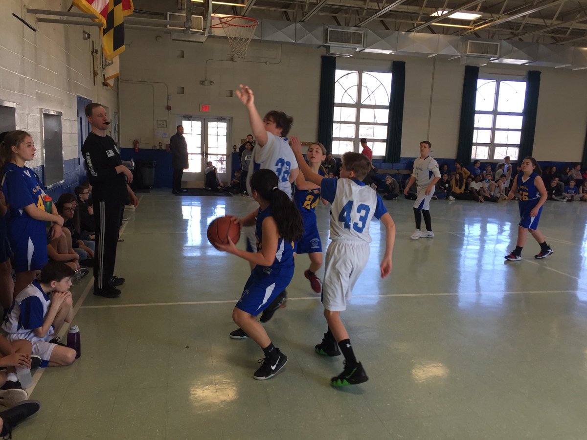 arvin5th's tweet photo. Action during the 8th grade basketball game. Part of our Catholic Schools’Week activities ⁦@StAugustineElem⁩ @principal567 https://t.co/8EnAINqKdF
