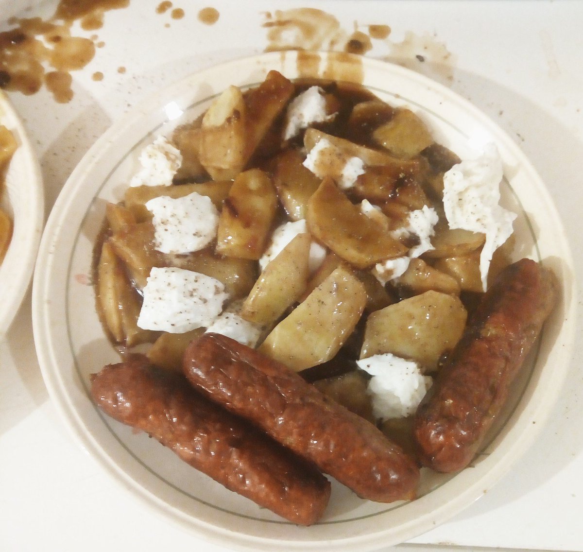 K_Burkhardt's tweet photo. @Caffienekitty and my other Canadian friends tonight I attempted poutine for mine and @NatashaBurkhar1 's dinner added bangers for a Canadian/British fusion dish 😁 #culinaryexperiments https://t.co/IwxnXGLEOu https://t.co/BQx7wtLhBm
