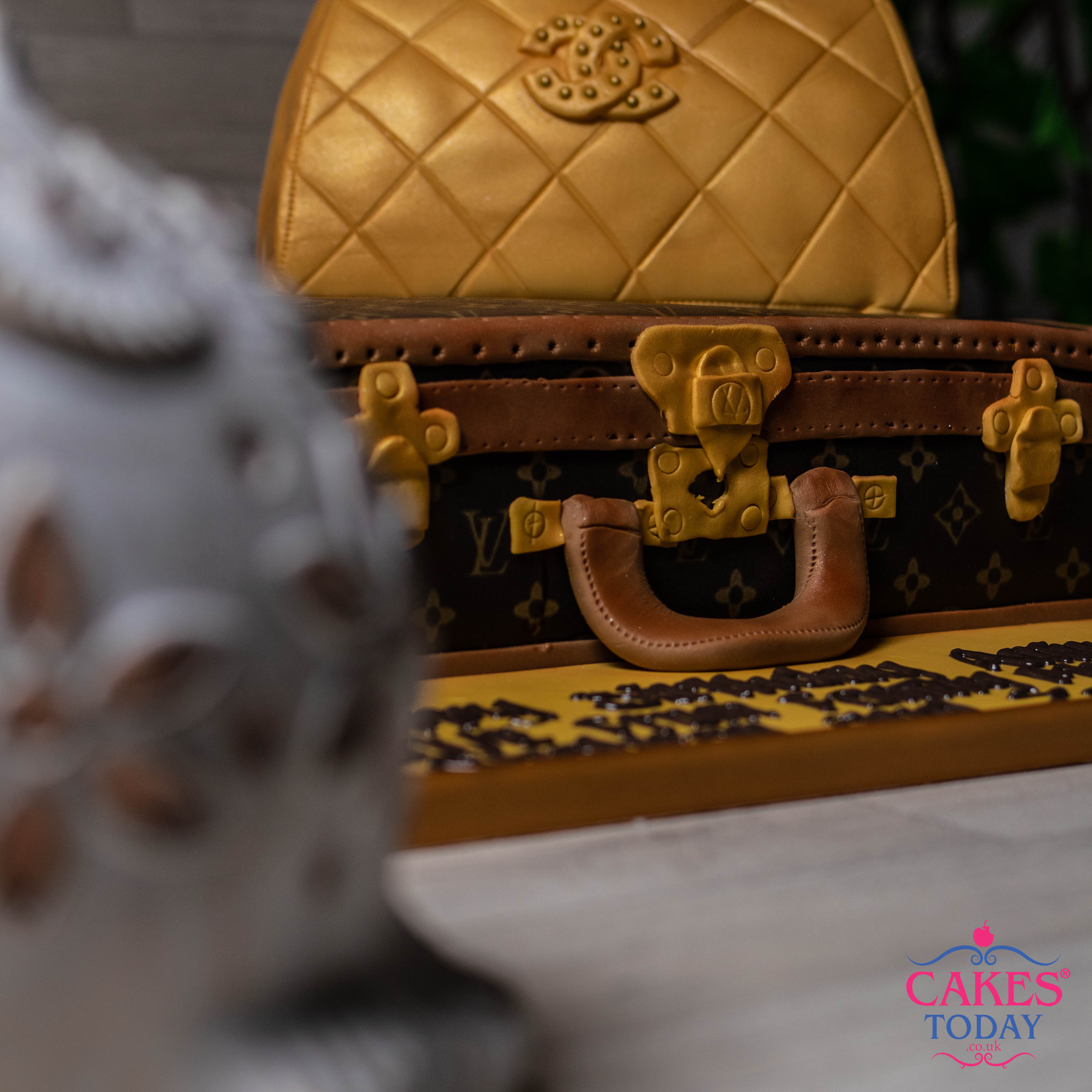 Cakes Today on X: A stunning sculpted Chanel Bag 👜 & Louis Vuitton  briefcase cake. 💼 Have a different design in mind? Let us know what kind  of Louis Vuitton bag cake