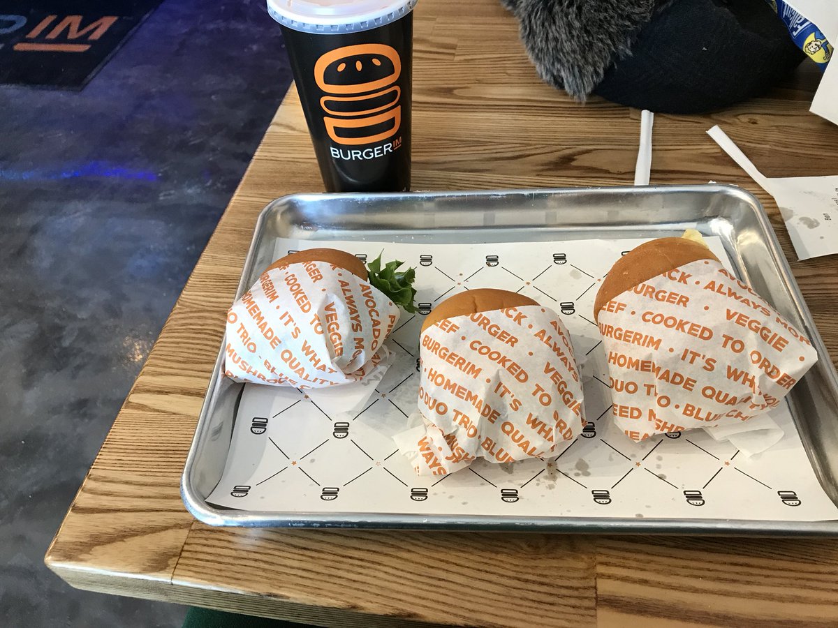 Trying the new <a href="/OFCLburgerim/">Official Burgerim</a> that opened in my local mall.  One is Spanish beef patty Cowboy style, one is wagyu beef California style, and one is lamb caliente style.