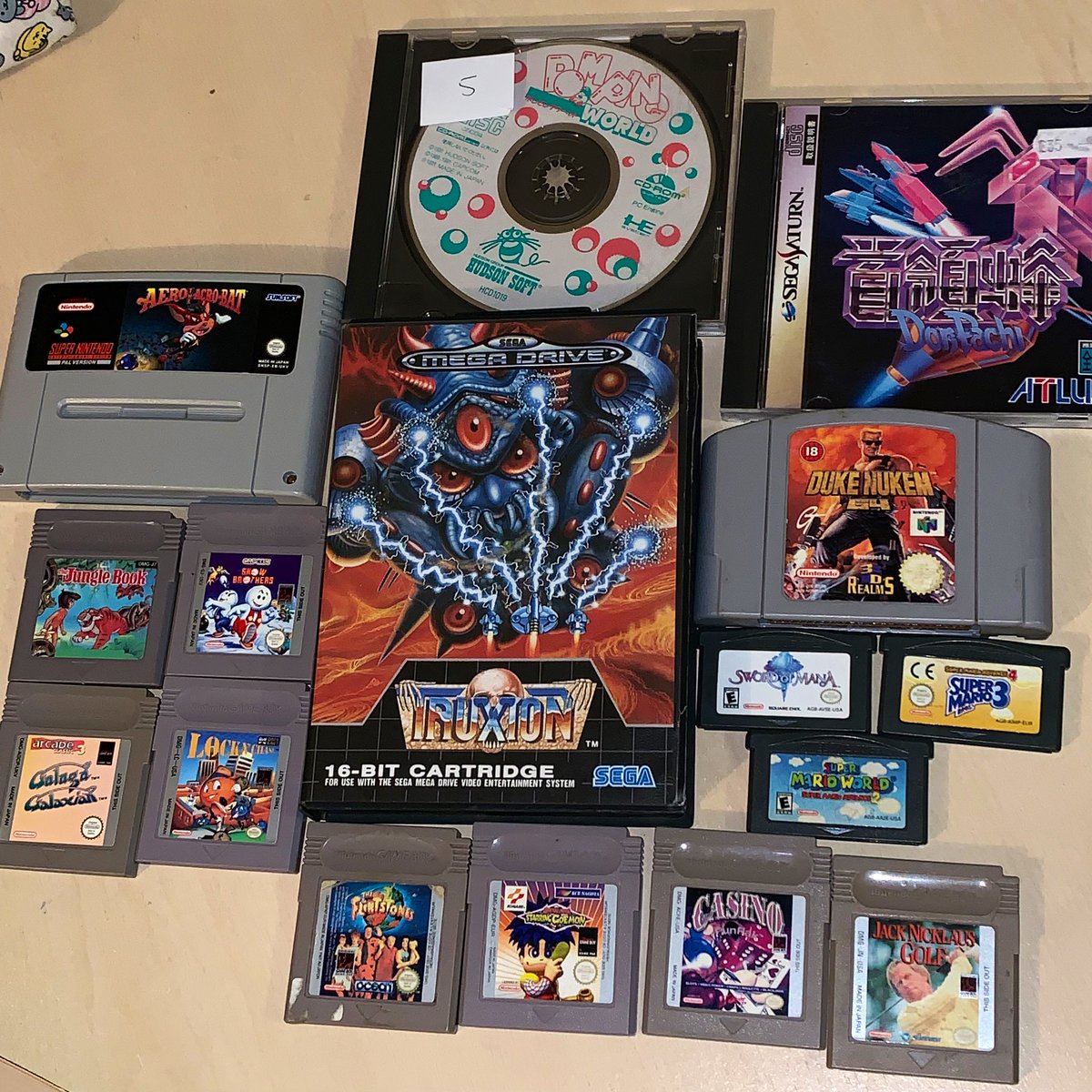 RetroBreakNick's tweet photo. Pickups from the retro market! Most excited to find Dodonpachi for the SEGA Saturn! Also happy to finally have Truxton and Snow Bros! #retrocollect #gamecollecting #retromarket #leedsretrogamesfair https://t.co/6UdVGdC6OR