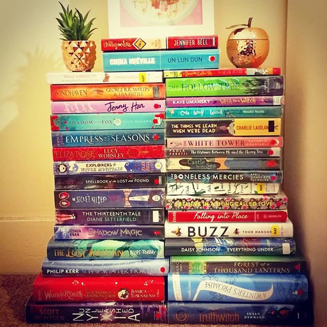 Chrikaru's tweet photo. My wonderful To-be-read pile from my local library - so many books that I'm excited to get stuck into reading! Do you spot any that you would like to read? Or any that you would recommend me bumping up the pile? #bookblogger #bookbloggerslife #booksofins… https://t.co/O73PACujdG https://t.co/72pHMHvjmB