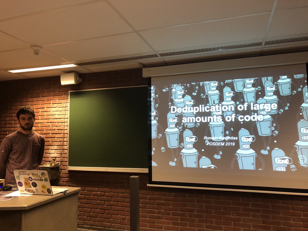 vcoisne's tweet image. Standing room only for Romain Kemaritas and his talk on de duplication of large amount of code with @sourcedtech Gemini github.com/src-d/gemini more information in this blog post blog.sourced.tech/post/deduplica… #fosdem #MLonCode