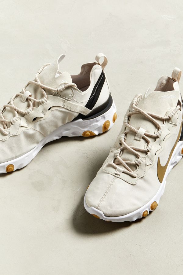 nike react element 55 gold swoosh