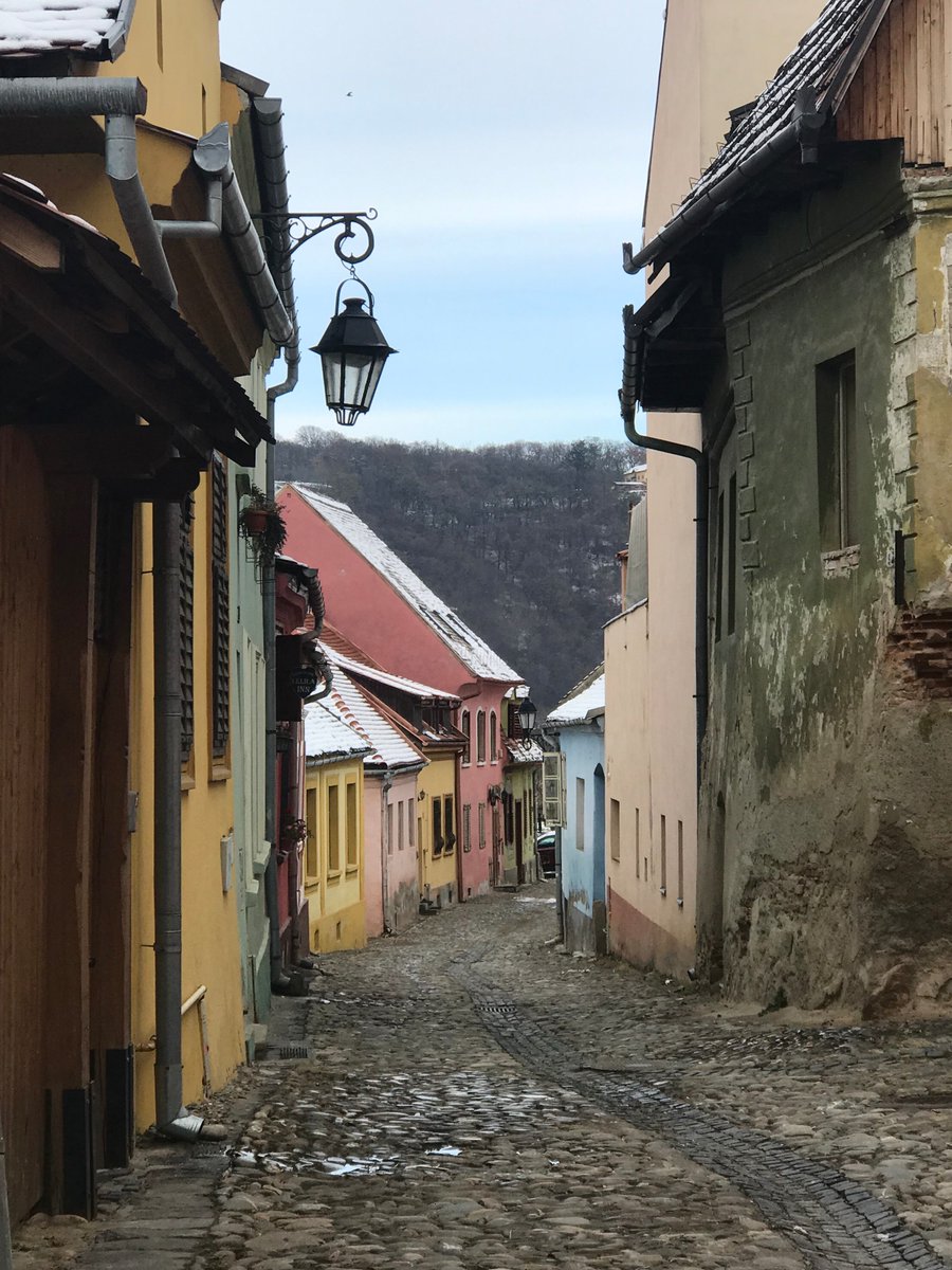 I wander all over the northern section without success. Steep cobbled streets, painted facades, hanging lanterns. All very cute... but no sign of the house.