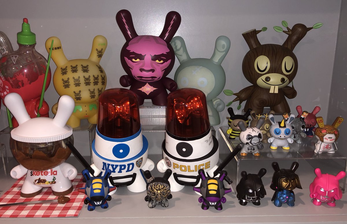 TheBlotSays's tweet photo. The other half of my Dunny / FatCap shelf with some of my favorite customs. Sadly don’t know where a few went after the hurricane. 😢 They survived the flood waters but their box never made it home.
#JRYU #SketOne #Sucklord #kaNO #Kidrobot #Dunny #ObeyGiant #AmandaVisell https://t.co/Ng1Kzme1FZ