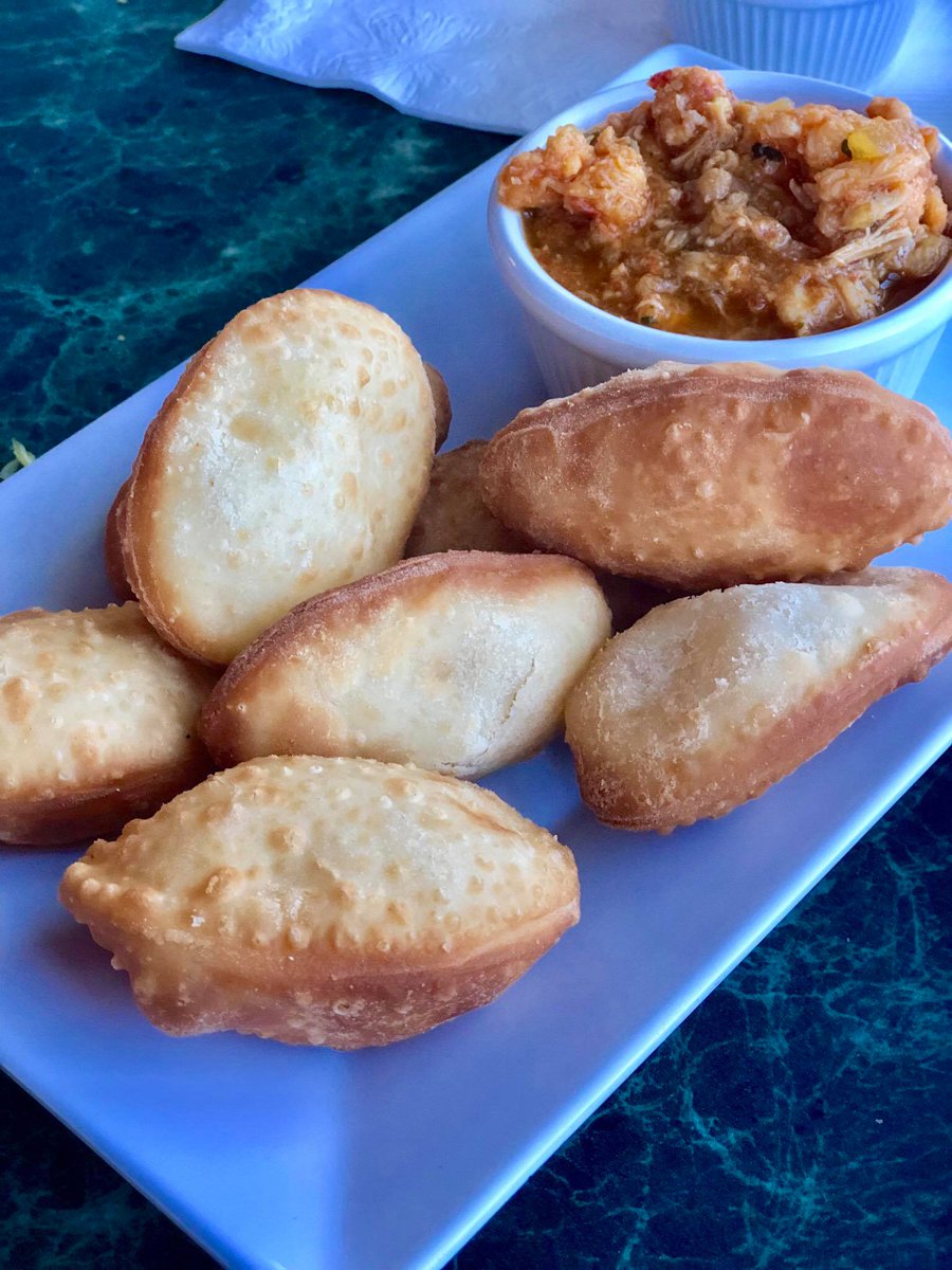 2MonkeysTravel's tweet photo. we immediately went to the most popular restaurant in town, El Dorado, to try their "fried fish tail" and domplines! yummy! @CTPuertoRico @discover_PR #DiscoverPuertoRico #PuertoRico #TwoMonkeysSailing https://t.co/tF3NnIhyt8