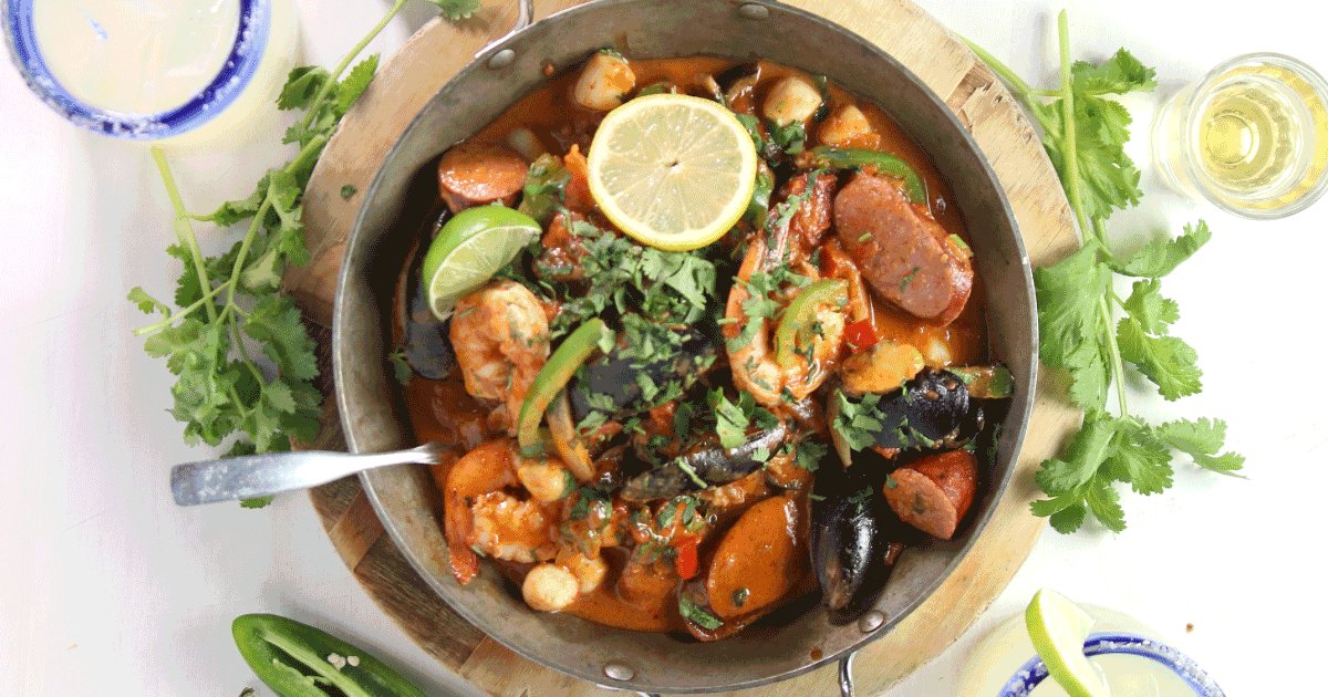Our Southwest Paella can be best described as an explosion of flavors. Made with jumbo shrimp, mussels, bay scallops, roasted poblanos, jalapeño Texas sausage, lobster cream, and cilantro-lime rice. ¡Buen provecho! #IronCactus #Paella #menu #mexicanfood