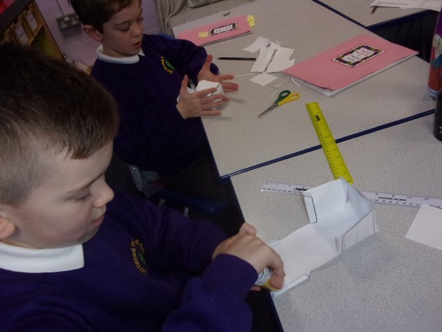 hatsarah's tweet photo. Y2 have been getting to grips with 3D shapes this afternoon and using them to make Tudor houses @GarswoodPrimary #greatfireoflondon #cubes #cuboids #triangularprisms #nets https://t.co/CayaweUWcp