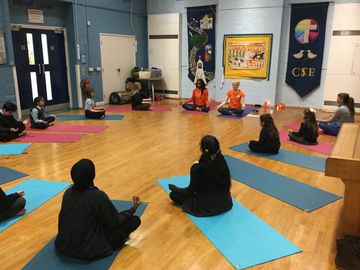StJamesJuniorS1's tweet photo. It's Wellbeing Week at St James' - today we had an after-school Yoga session for children, families and staff with Gloucestershire Yoga For All. Baaa-rton joined in too! #Baaa-rton #GoodShepherdProject @glosdiocschools @GlosDioc https://t.co/EDn024QeSN