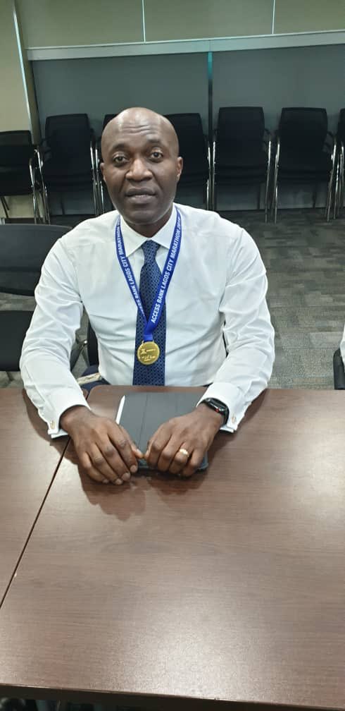 Our workplace dress code has strict guidelines on jewelry, but when Deputy  Managing Director, Roosevelt walks into a meeting with this particular  piece of jewelry, an exception has to be made. Congratulations,