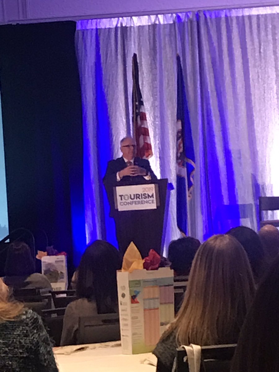 OutdoorsShowMN's tweet photo. Standing ovation for Governor @Tim_Walz at the @exploreminn conference. He mentions efforts like trout stream restoration leading to B&amp;Bs popping up nearby. https://t.co/RfoX3igD5n