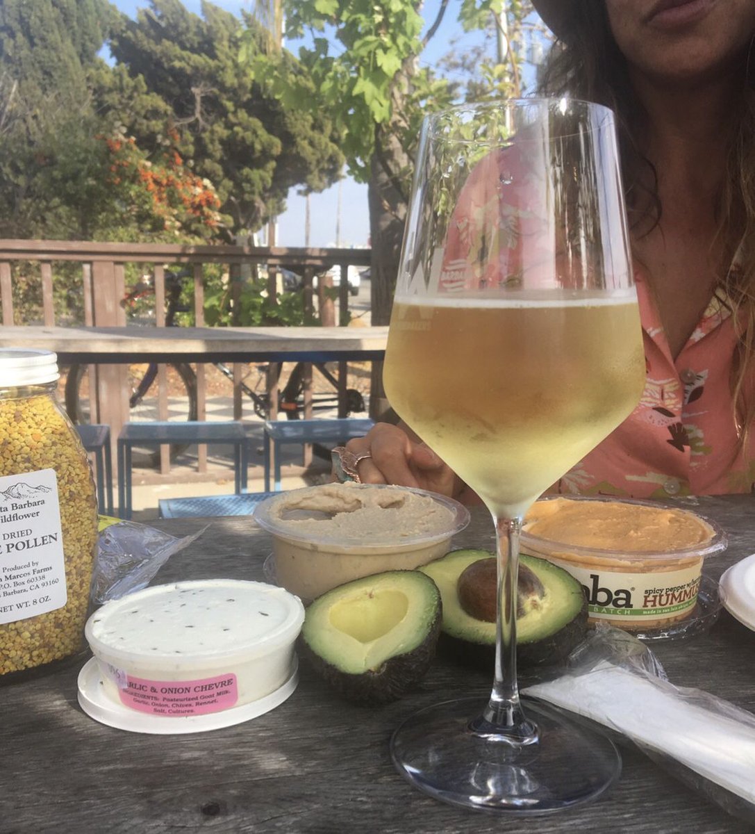 Our wine garden is the best place to be // so close you can smell the ocean -  Get a bottle, pour yourself! Nothin like a little wine + snack sesh 🌴 🌴 🌴  #muniwineoutside #diversden