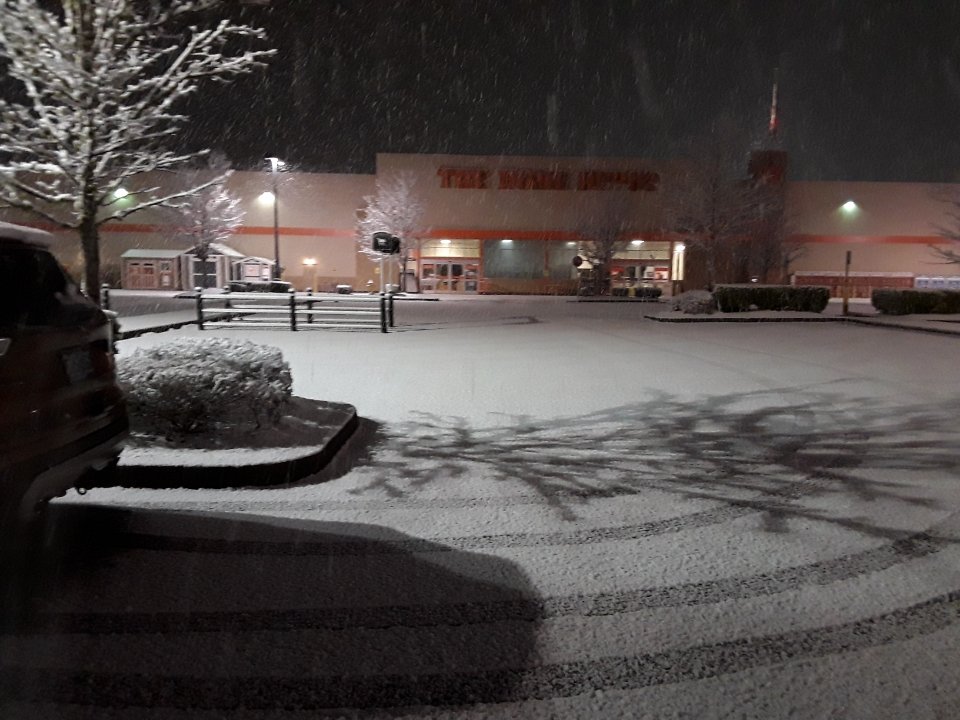 Snowing at the coast!  4023 experiences a rare snowstorm Monday moring!