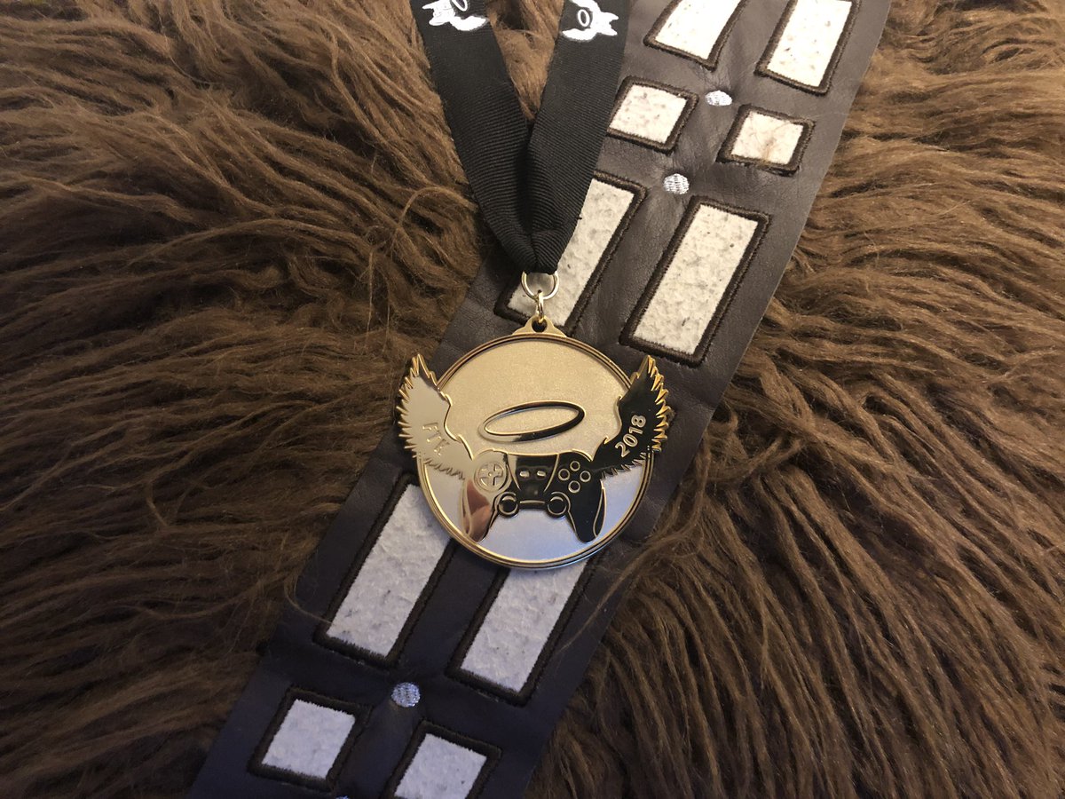 LorenzoLeone's tweet photo. Chewie finally gets his medal! I can’t believe I made gold 2nd time out! Thanks to @cpgarchitects for making all the contributions and thank you @ExtraLife4Kids for running such an amazing fundraiser. #StarWars #FortheKids https://t.co/P8iO0LXsFR
