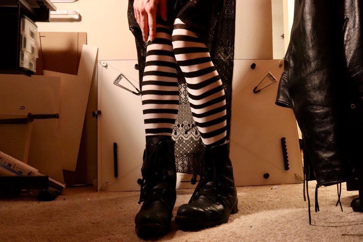 Sooo, skirt, stockings, boots. Didn’t feel up to a full body shot. And yeah, stripey Tim Burton-esque stockings and a layered lacey skirt is a goth cliche. But it’s what I like.