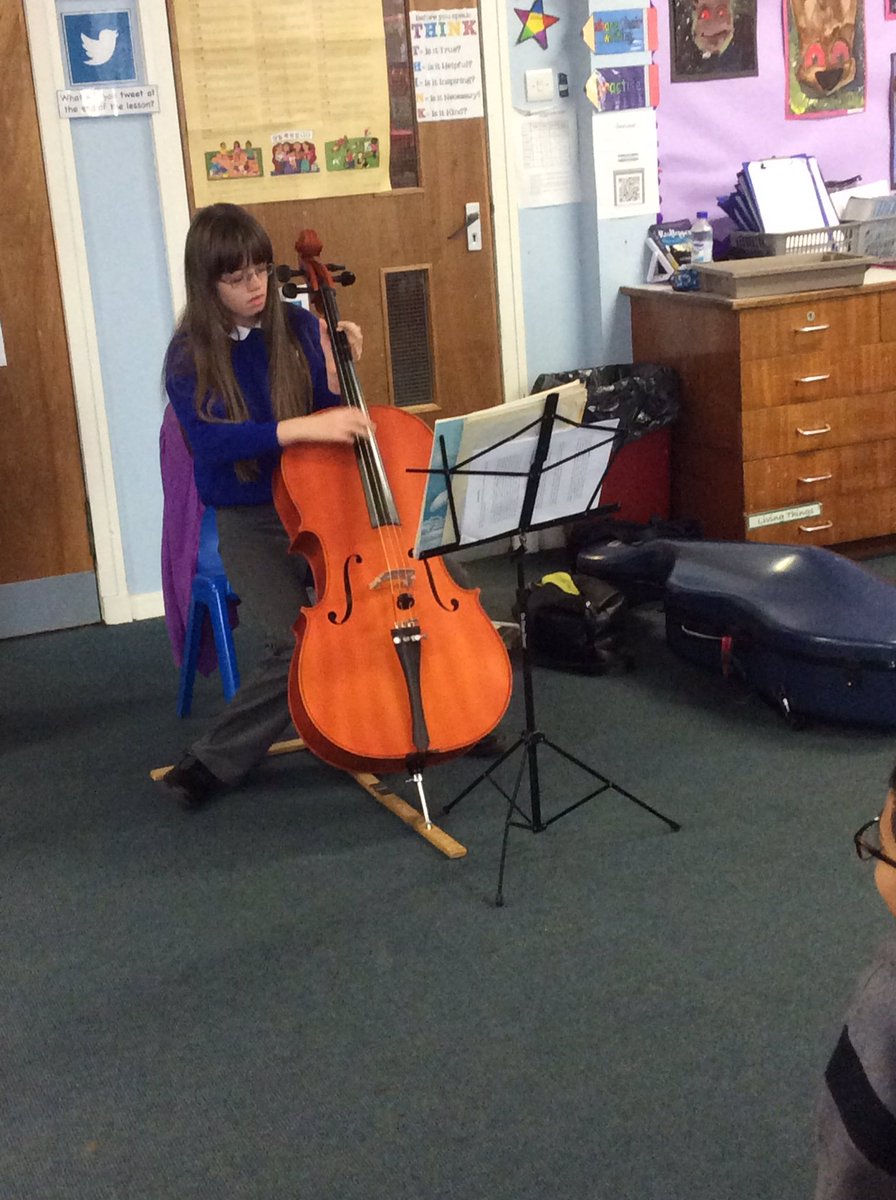 ArklestonSchool's tweet photo. We even got a chance to try the cello and hear how it sounds! We loved reading Rooftoppers! #readingrocks #linkingourlearning @AttainRenLit @AttainRen https://t.co/pMtoPwTI9Z