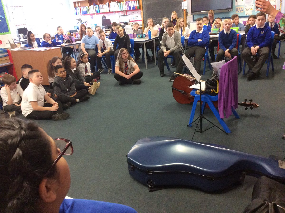 ArklestonSchool's tweet photo. Listening intently to our expert visitor today who has come to talk to P6, P7/6 and P7 about Rooftoppers by Katherine Rundell and the cello which features so heavily in the book. #readingrocks #linkingourlearning @AttainRen https://t.co/16jXYlLrex