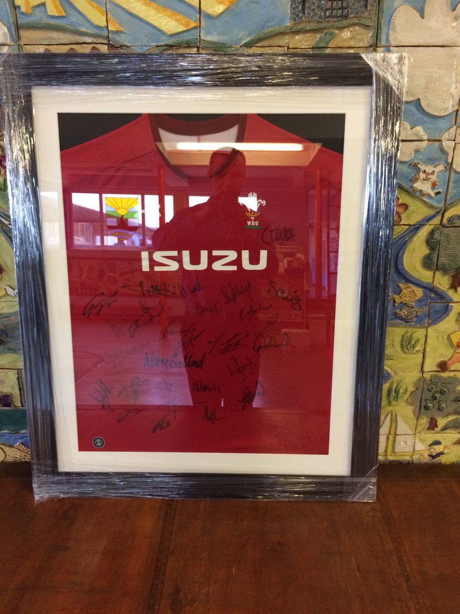 ClwydPrimary's tweet photo. Raffle tickets are available for this framed ( thanks ⁦@framersteve⁩ ) Wales jersey signed by the whole Welsh squad. All proceeds go to a great cause for one  of our children in school. https://t.co/xnYfVRgjRg