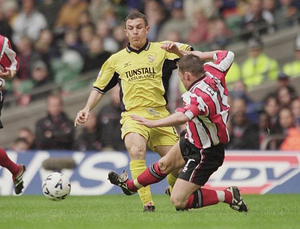 BestPVFCGames's tweet photo. Port Vale 2-1 Brentford - After going behind early on in the 2001 LDV Vans Trophy final, Vale win 2-1 with goals from @Bridgey1979 and Steve Brooker at a rain soaked Millennium Stadium. Special mention to club captain on the day Matt Carragher R.I.P #pvfc https://t.co/cT60iV463X