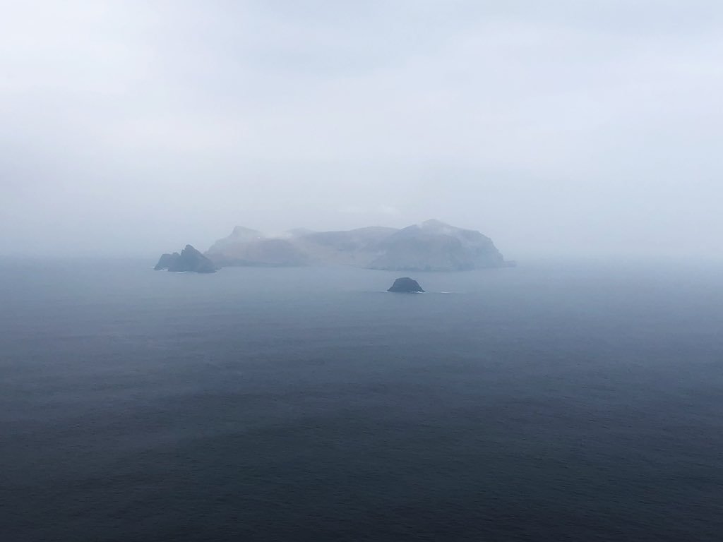 StKildaNTS's tweet photo. We had an early start this morning from Balmacara, helicoptering from Kyle over Skye to Benbecula, then we successfully attempted the crossing to St Kilda despite the rough weather.  #stkilda #winterdamage #hebrides #commute https://t.co/xDLUNK8x97