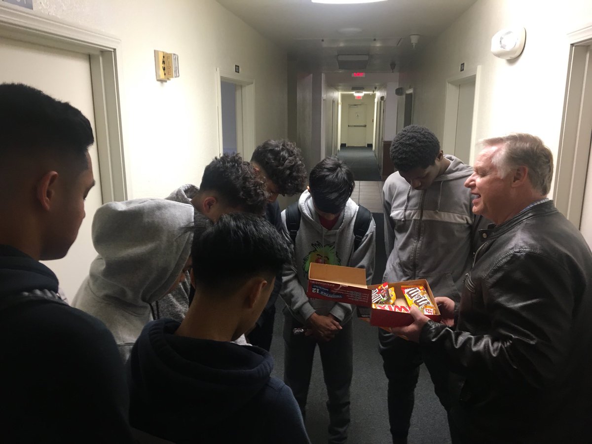 JoshuaMontana's tweet photo. Dr. Schettler praying with one of the HS basketball teams visiting for the Tip-Off Tournament. #WeeklyDormVisit #TeamBethel #WCBCedu @wcbc_today https://t.co/ezrlmJ6YfW
