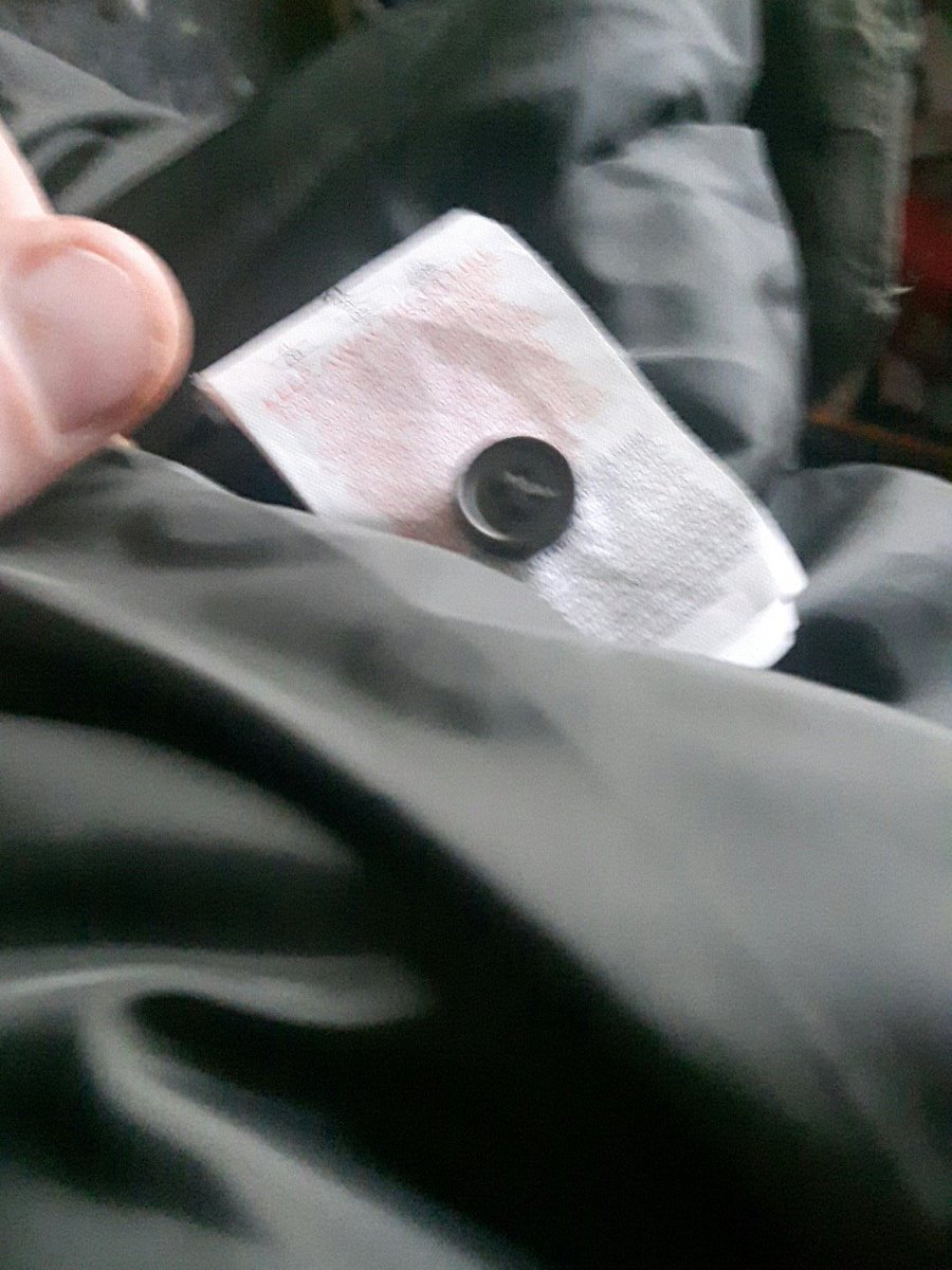 RowlesAaron's tweet image. It is so cute when a new coat has a free button attached to the label.