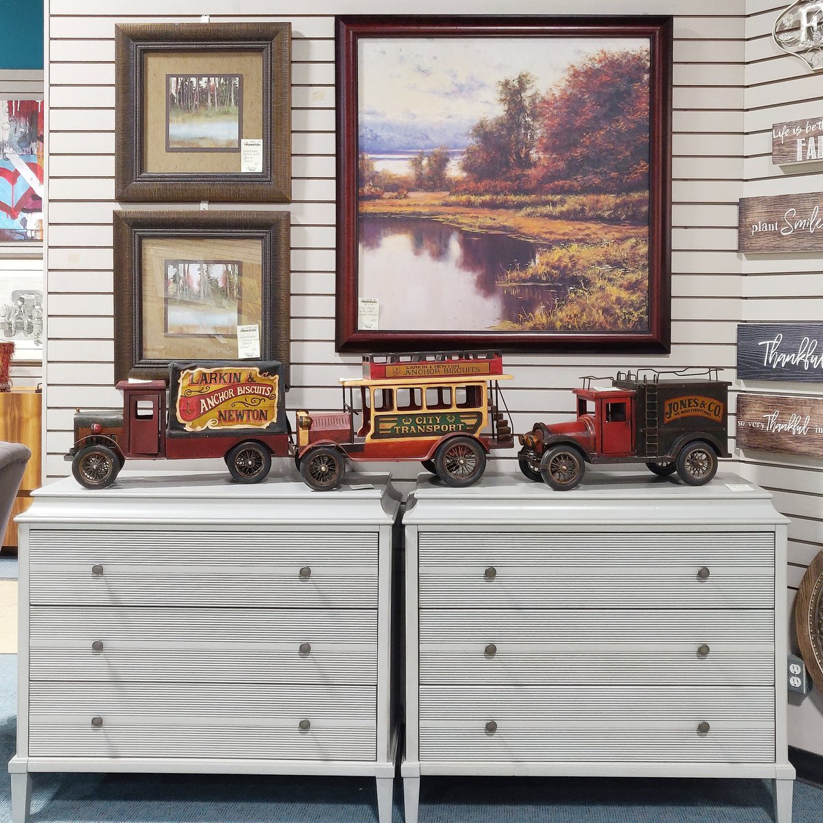 With their antique style, these wood trucks come in various designs to bring a little character to any room. 

14700-3 Antique City Transport Wood Truck. Our Price $195
14700-4 Antique Jones &amp; Co. Wood Truck. Our Price $195
1810-521 Grey 3 Door Dresser (Universal). Our Price $795