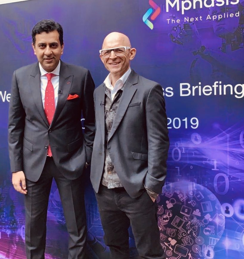Mphasis's tweet photo. “How can we enable enterprises to adopt technology by applying all that’s available now in the modern technology domain to get them closer to their end consumers,” @nitinrakesh details Mphasis’ mission, in conversation with @JasonBradbury. #MphasisInUK #StayAhead https://t.co/GuNT1j8EuY