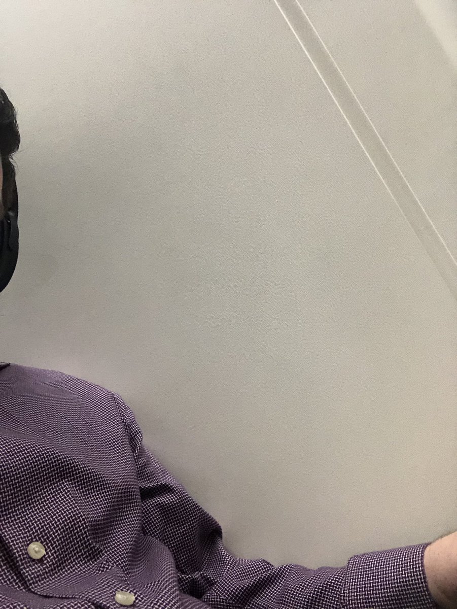 nsimondssays's tweet photo. I always get an window seat when I fly. Sat down without paying attention, slid to the window seat, got all settled and went to raise my window shade and this happened. #CoffeePleaseKickIn. #WindowlessWindowSeat https://t.co/vBpyfmS8m4