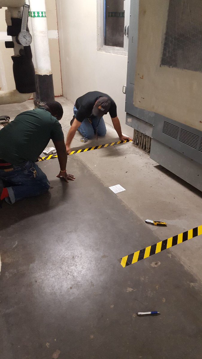 KoryBush24's tweet image. Angelo and Tyrell marking in front of our electrical panels. #ZoneOne #GettingItDone ⁦@BESBULLPUPS⁩ ⁦@FCSD_plantsvcs⁩