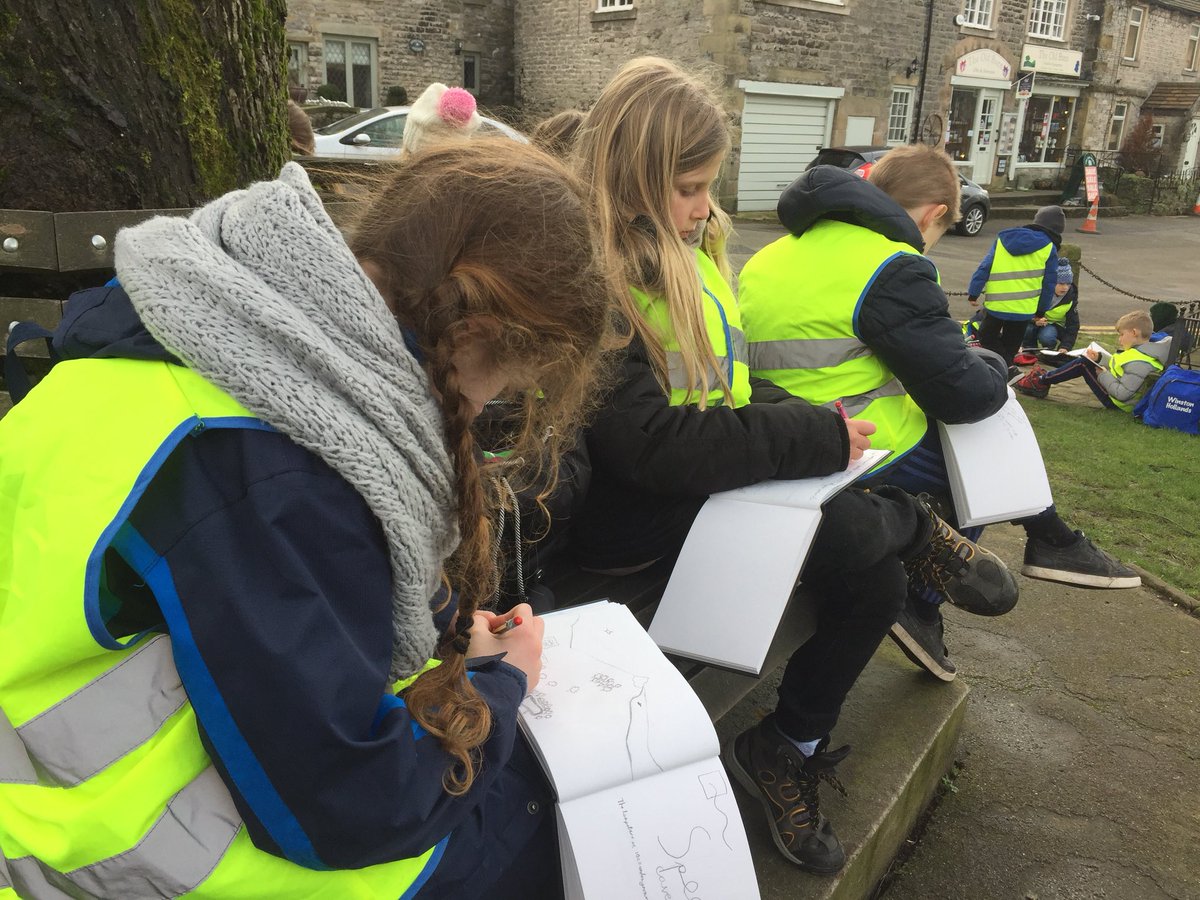 Sketching in our black books near the Old Market Place in Castleton. <a href="/SchoolWhitegate/">Whitegate C/E School</a>