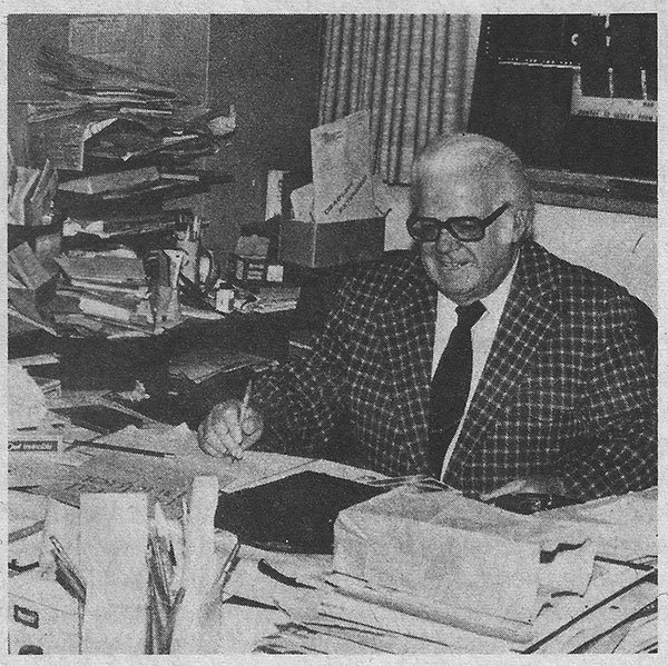 Frank Tunney at his desk in early 1982. There are lots of stories of unopened cheques and bills from years before sitting on his overcrowded desk going back to the 1940's. This is Franks' last office at 27 Carlton. Jack later moved to Downsview post WWF