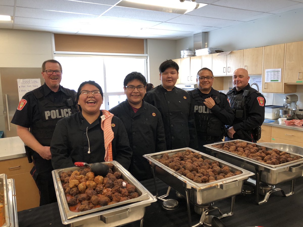 Mizshar10's tweet photo. DFC lunch fundraiser is in full swing! Miigwech to TBPS Beat Patrol officers Wayne R, Larry B and Jason K for helping out. Miigwech to NAN Grand Chief Alvin for the meatball taste testing. @tbpsmedia @NANComms #pastaandmeatballs #FirstNationsTradeSchool #Prom2019 #StudentCouncil https://t.co/NnhXOcbM67