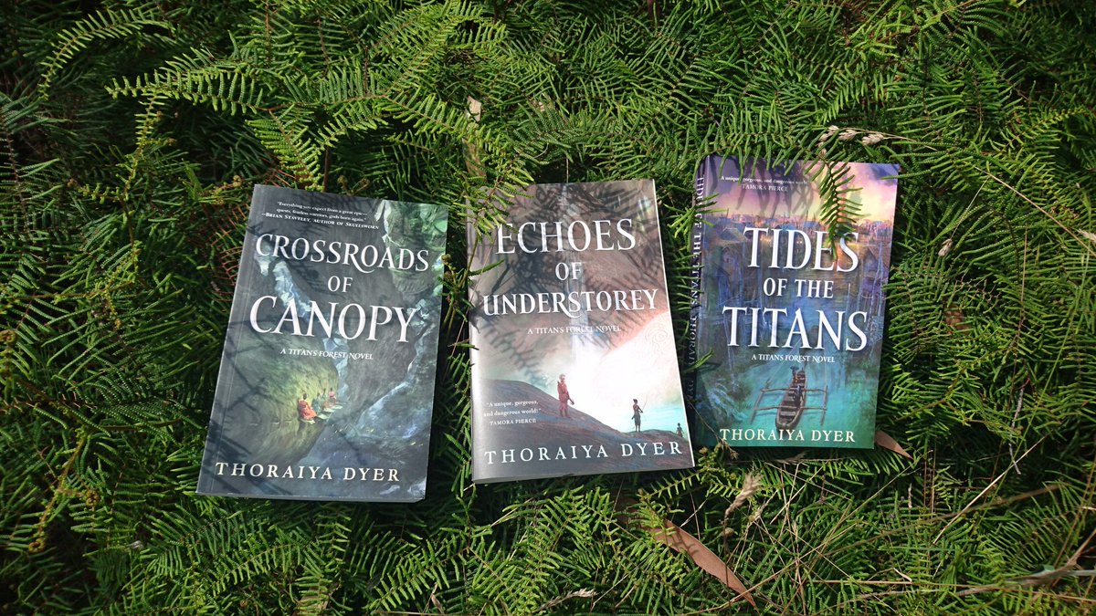 ThoraiyaDyer's tweet photo. You knew I'd never resist posing my completed rainforest trilogy in the rainforest :) #CrossroadsofCanopy #EchoesofUnderstorey #TidesoftheTitans https://t.co/2c6v6R2DFk