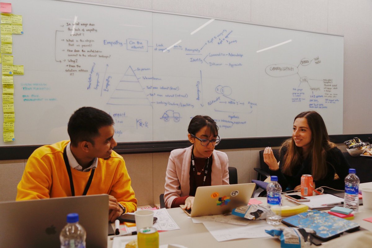 .⁦IxDASDC⁩ students, Dinesh Ram, ambika_vohra, and ⁦gloriana_omodeo⁩ stay heads down on their challenge to discuss how lack of empathy manifests itself. #EmpathyAtScale #IxD19 #Interact19  #Microsoft #Design