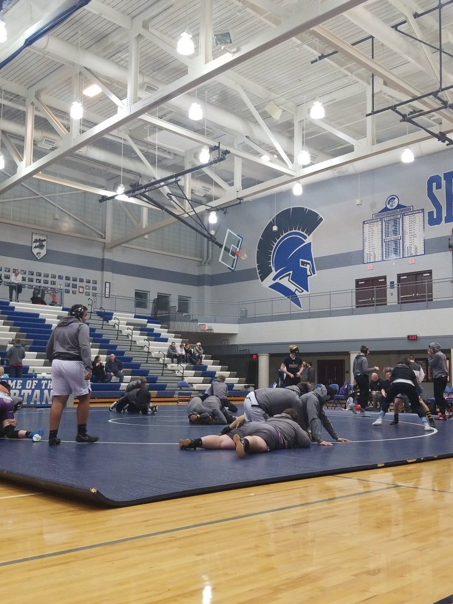 Scoopahloop's tweet photo. Greenville wrestlers warming up for their Div. 2, District 142 finals matchup with Cedar Springs in Sparta. While the Jackets advanced via a bye, Cedar beat Sparta 38-30 to advance @AlexFreebird @Greenville_HS @greenvilledn @michgrappler @MHSAA https://t.co/8MyoZr1oz2