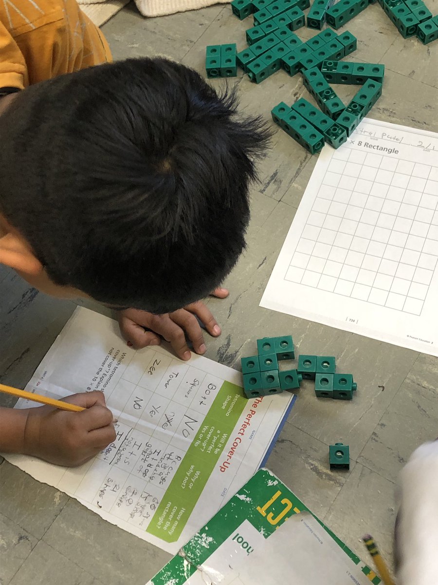 Students working together to help each other learn about Area.  <a href="/LincolnSchool8/">Lincoln School</a> #lncproud