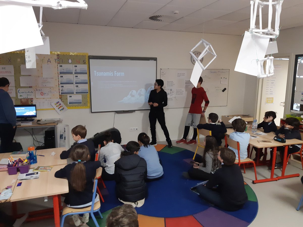 Year 9 Geography students teaching 4J about earthquakes and volcanoes.