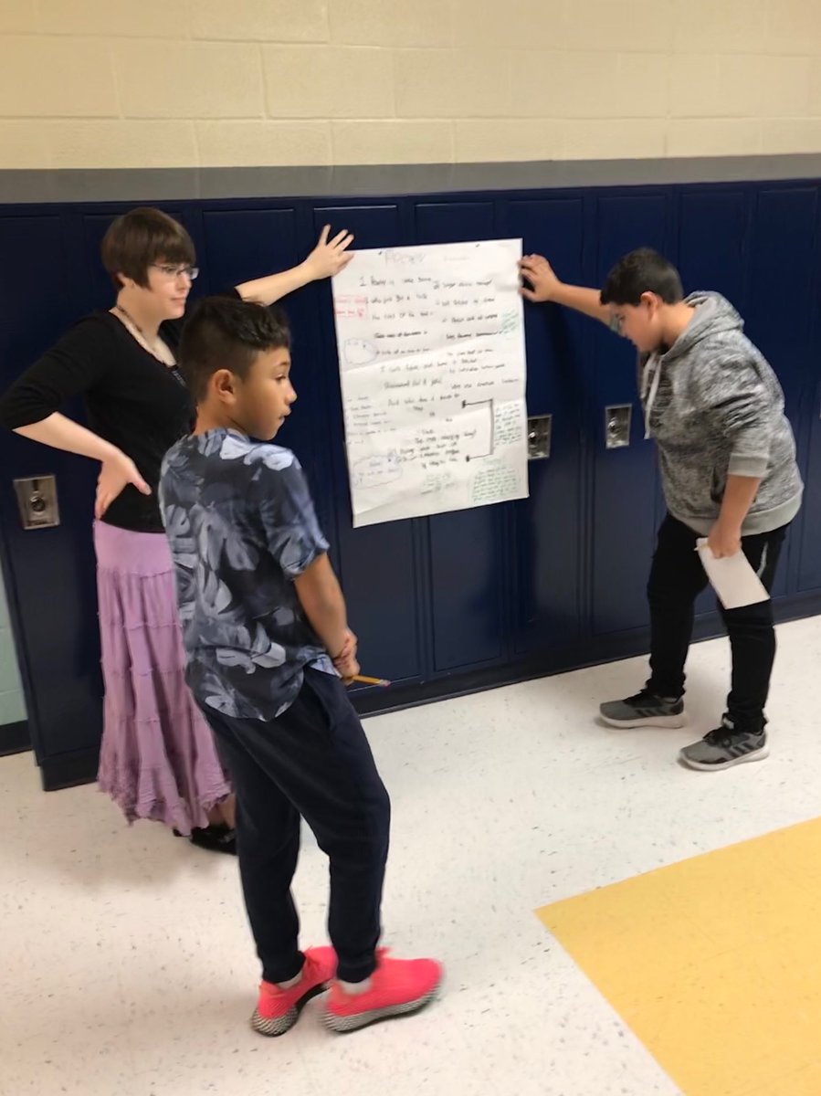 ktmadigan's tweet photo. Presenting poems to their partners, explaining their thinking behind mood, theme, plot and figurative language. @teachforthem @GlasgowMS #unit19 https://t.co/t4aBMxtfTl