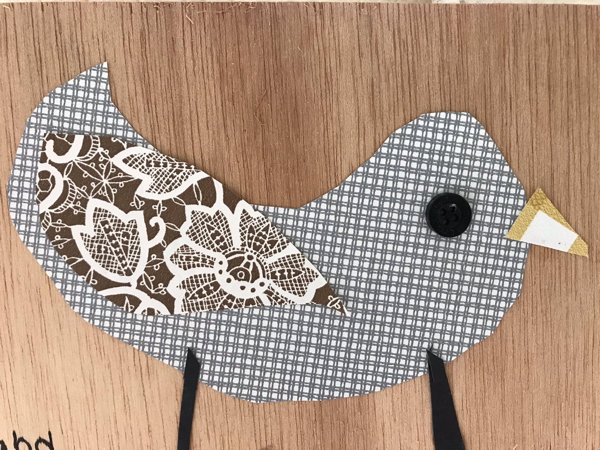 Kindergarten birds: paper collages on wooden panels