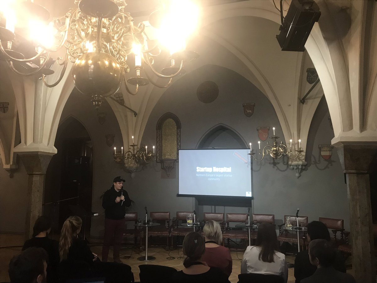 StartinLV's tweet photo. When traveling to Helsinki, don’t forget to visit THE hospital - @MariaZeroOne co-working place! 

Voitto Kangas talkig about the benfits of having a large coworking place for tech companies! @RigaVSummit 2019 https://t.co/34ZOg1Rnjy