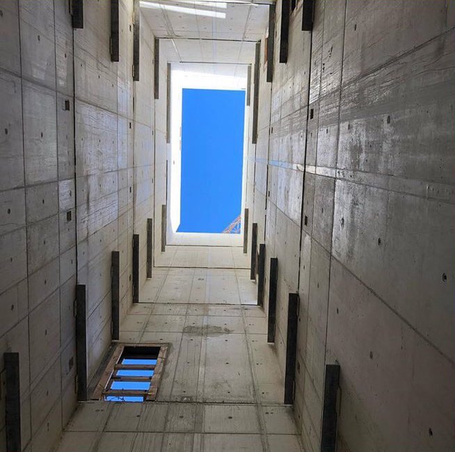 NOAHH_network's tweet photo. Placing the elevator shafts at our newly constructed #OCC (International Education and Culture Cluster) in The Hague. The staircase will follow in the coming days. Photo by @spuikwartier. #NOAHH #networkorientedarchitecture #architecture #construction #denhaag #spuikwartier https://t.co/2DhuEohdFa
