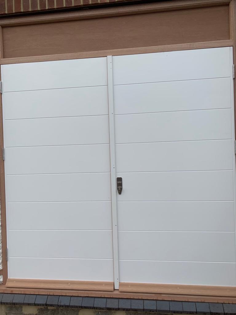carpentryandi's tweet image. New garage doors fitted with a #Banham lock for extra high security.