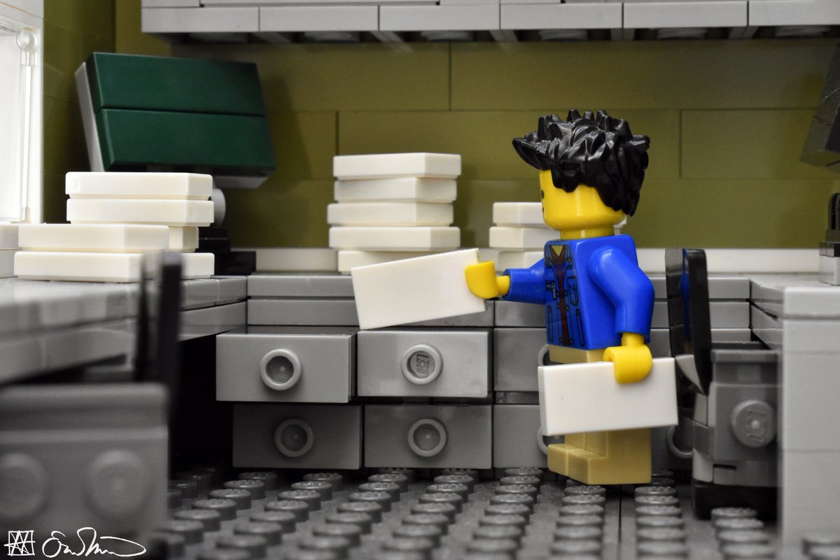 legogradstudent's tweet photo. Reorganizing papers that he has no serious plans to read, the grad student engages in barely productive procrastination. https://t.co/VAZxUf1bNX